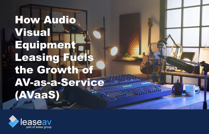 Audio mix deck on a desk with additional equipment to illustrate the benefits of audio visual equipment leasing and financing