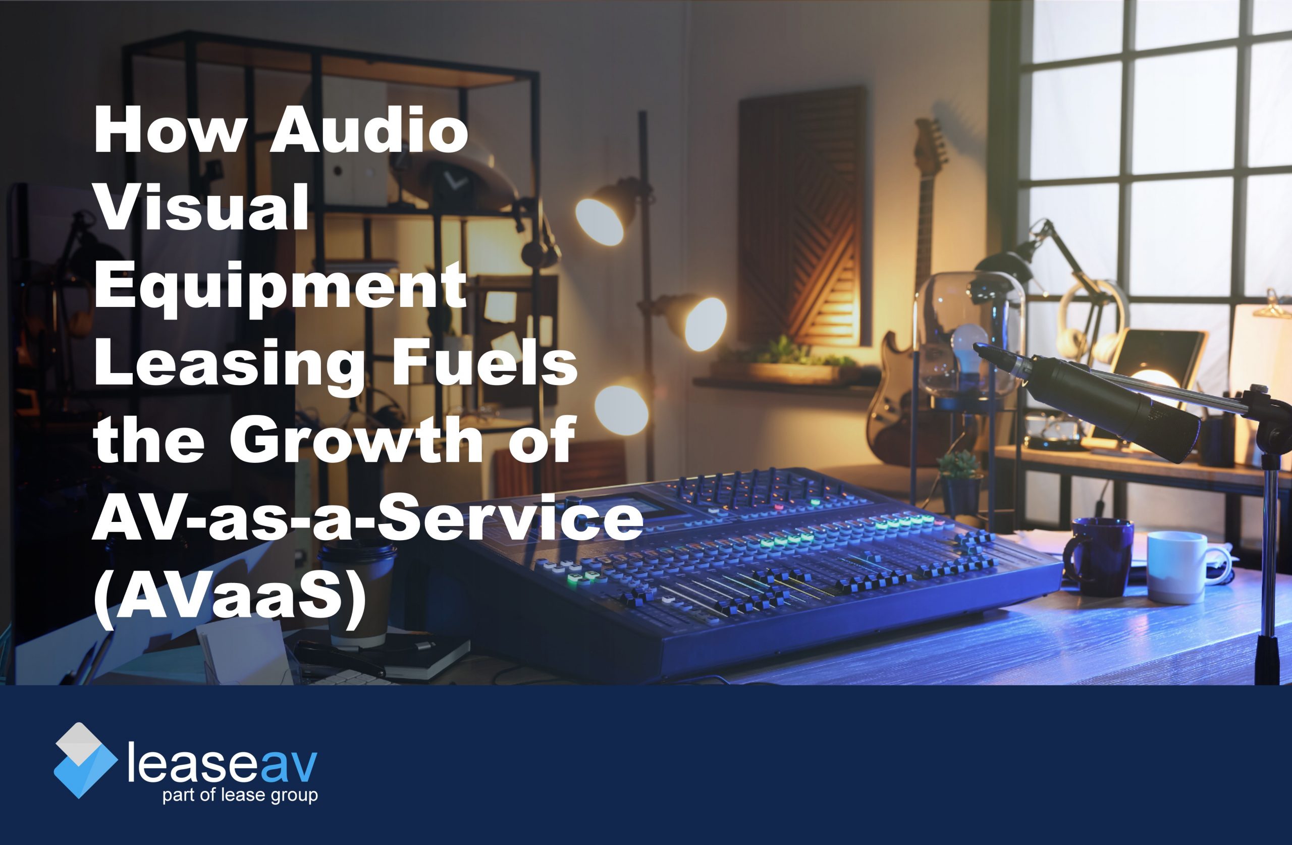 Audio mix deck on a desk with additional equipment to illustrate the benefits of audio visual equipment leasing and financing