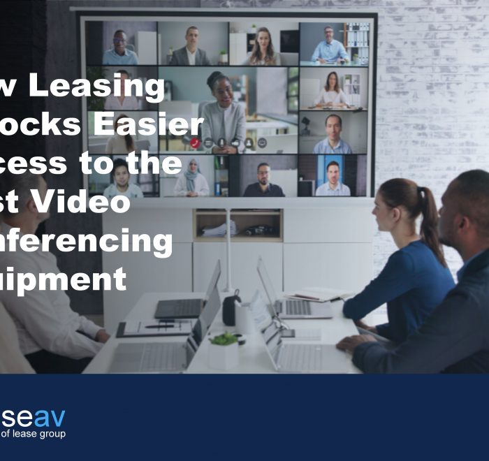 Image of a team in an office on a conference call to illustrate the benefits of leasing to upgrade video conferencing equipment