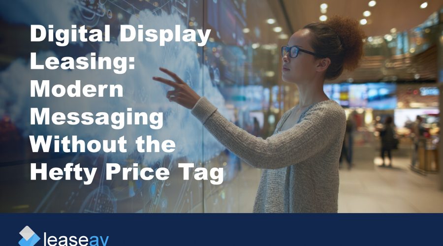 Image of woman touching interactive digital display screen to illustrate the benefits of digital display leasing