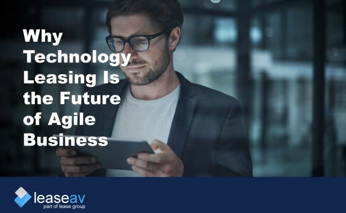 Title image of a man holding a tablet device to illustrate the benefits of technology leasing