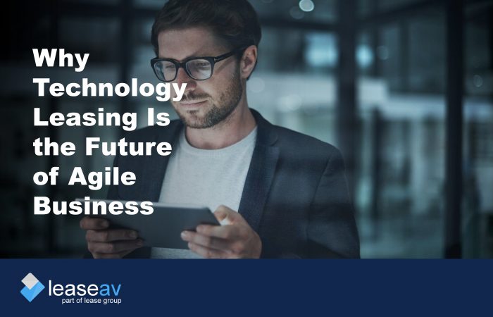 Title image of a man holding a tablet device to illustrate the benefits of technology leasing