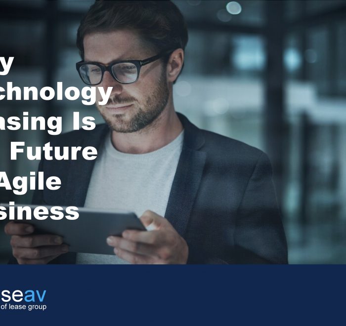 Title image of a man holding a tablet device to illustrate the benefits of technology leasing